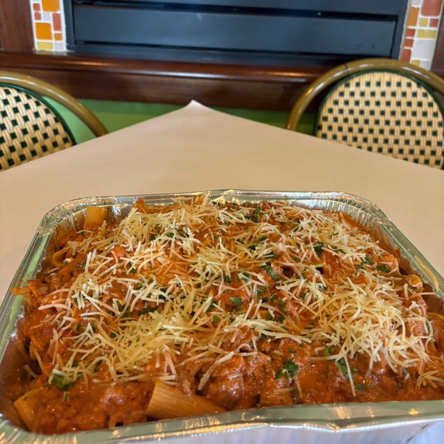 1/2 Tray Rigatoni Bolognese Comes W/ Salad.