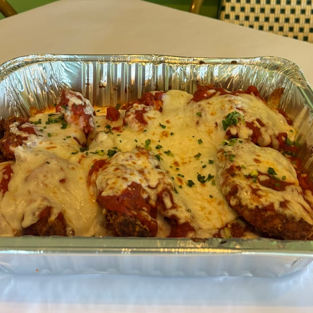1/2 Tray of Chicken Parmigiana Comes w/ Salad.